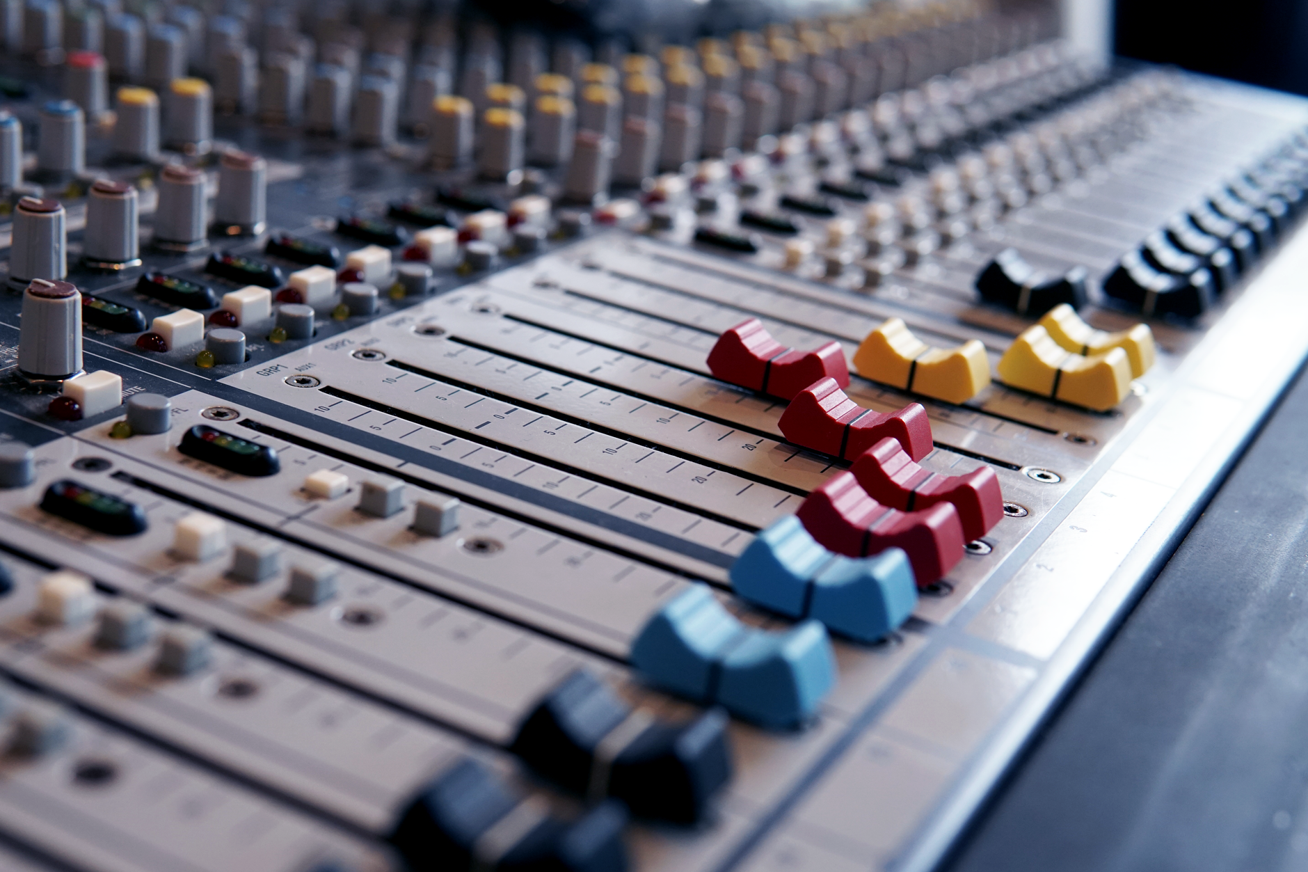 Close up editing panel screen detailing multi track sound mix
